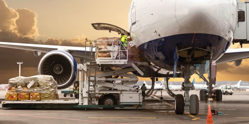 unloading cargo on airport tarmac